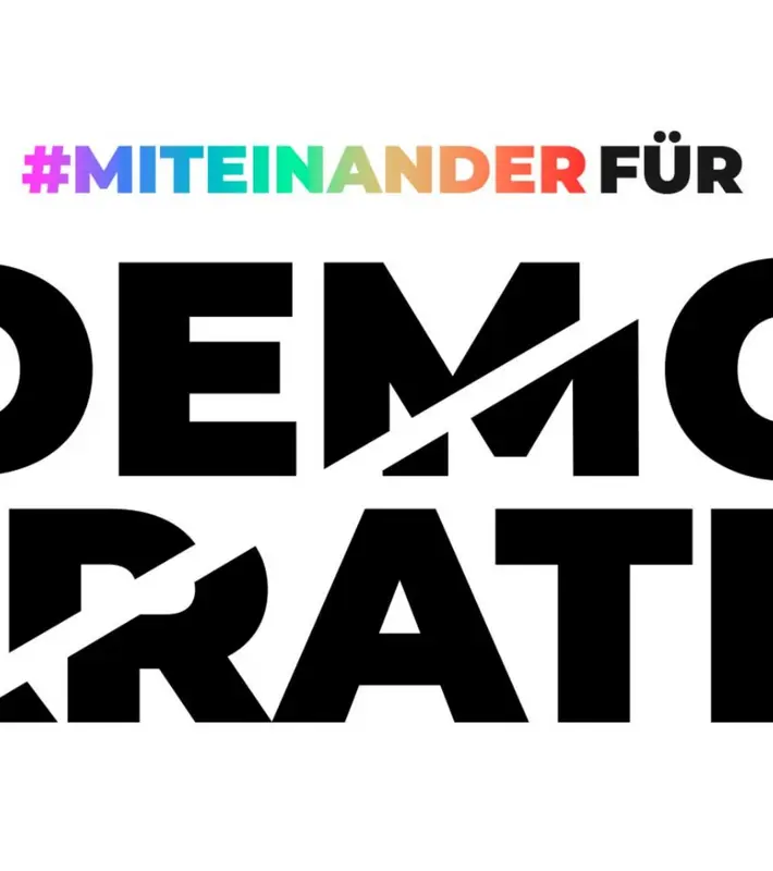 Miteinander für Demokratie Logo. 